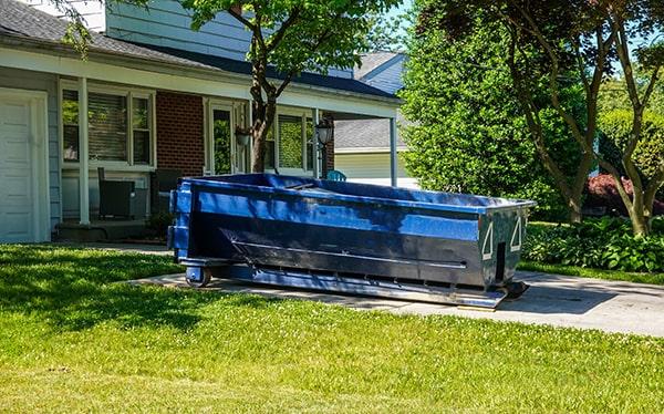 residential dumpsters can be placed on a driveway or yard, but precautions should be required to avoid damage to the property